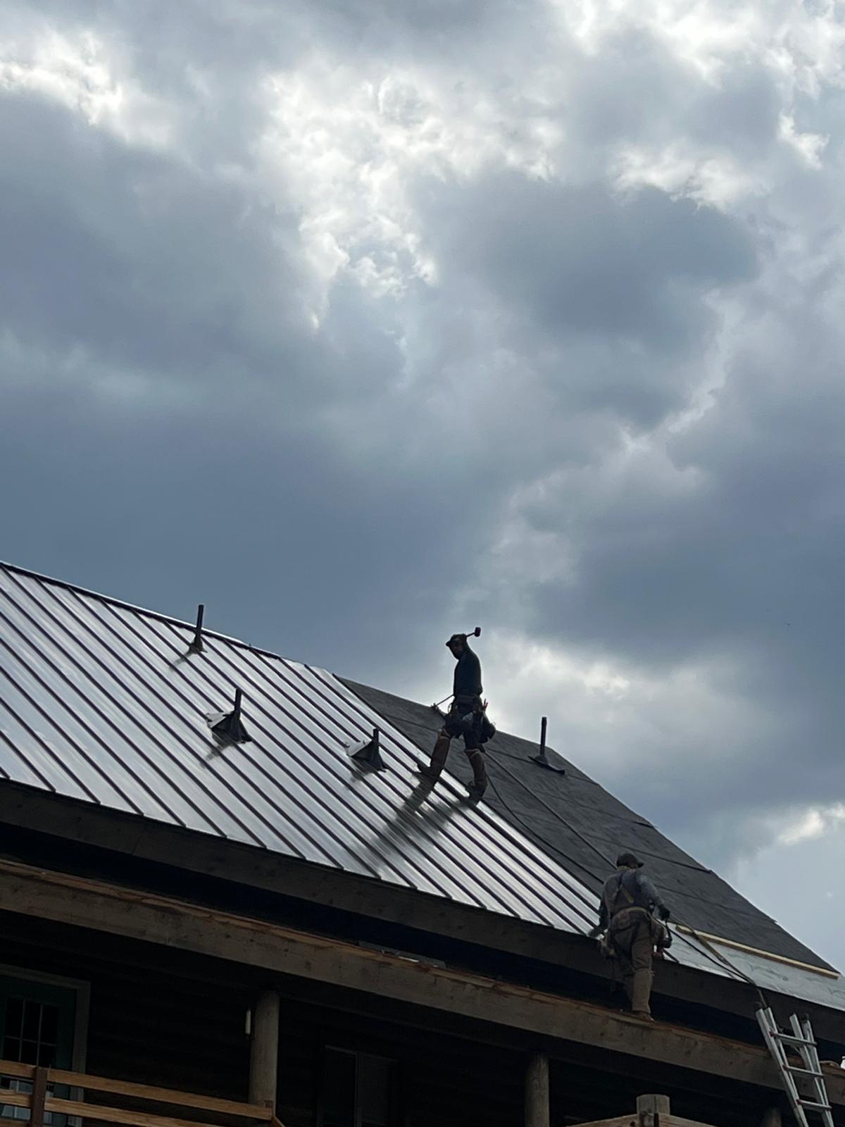 Metal roof installation in progress